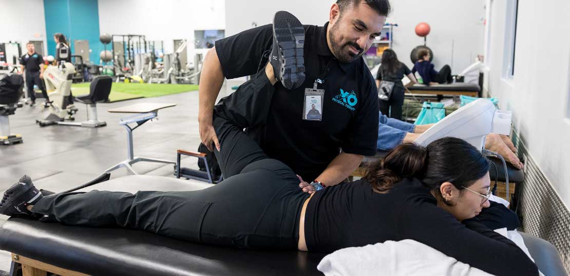 A man participates in a physical therapy session, rehabilitation exercises.