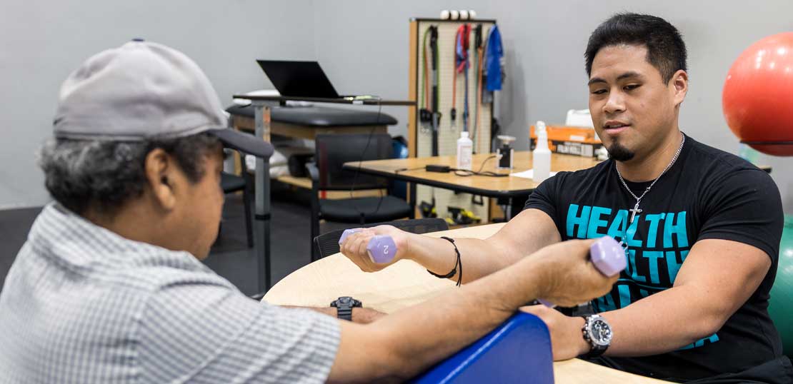 Person receiving physical shoulder therapy in XO clinic